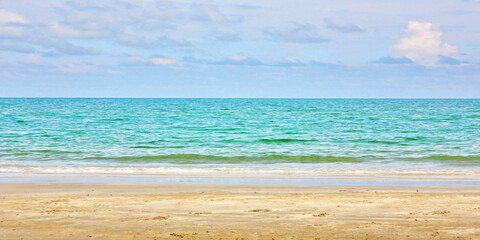 the beautiful sea sand beach with blue sky white cloud panorama nature background