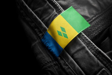 Tag on dark clothing in the form of the flag of the Saint Vincent