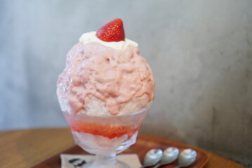 Strawberry Yogurt pannacotta kakigori, Shaved ice in japanese style. Strawberry shaved ice topped with yogurt and fresh strawberry and milk pannacotta inside.