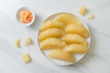 Fresh peeled pomelo, grapefruit or shaddock