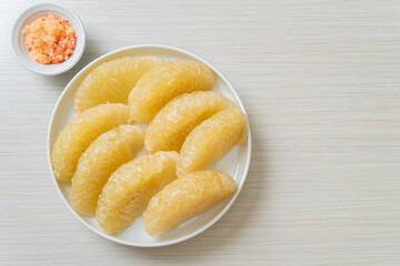 Fresh peeled pomelo, grapefruit or shaddock