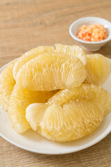 Fresh peeled pomelo, grapefruit or shaddock