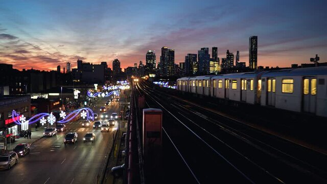 Train arriving to a metro station in Brooklyn New York on a sunny summer day