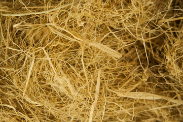 yellow straw texture closeup on a hot summer day