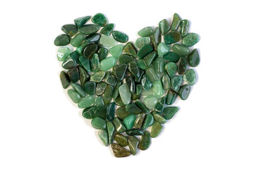 Macrophoto of natural mineral rock specimen - tumbled green aventurine gemstone heart shape...