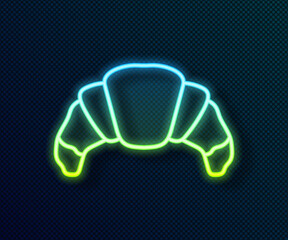Glowing neon line Croissant icon isolated on black background. Vector.