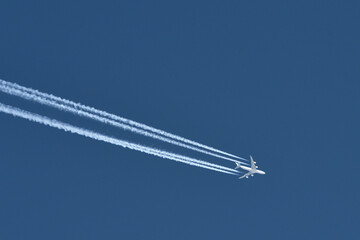 Airplane In Blue Sky