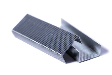 Blue stapler and staples Isolated on white background.