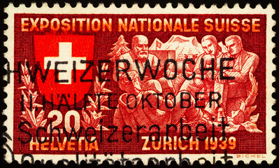 Visitors listen to a poet