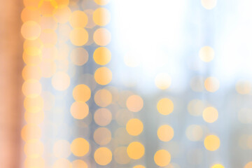 Yellow bokeh lights blur . new year's defocus. lights of the bokeh garland. Copy space