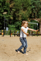 emotional little girl running barefoot on the sand