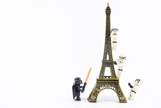 Bangkok, Thailand - January, 17, 2021 :  Lego Star Wars climbing the Eiffel Tower toy at Bangkok, Thailand.Fun scene concept