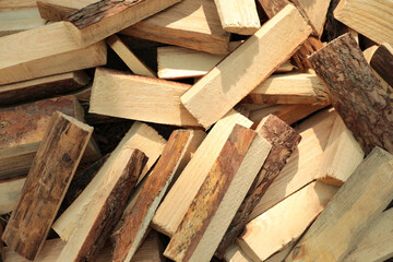 Pile of cut firewood as background, top view