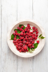 Overhead view of baking dish with raspberry, summer pie  recipe