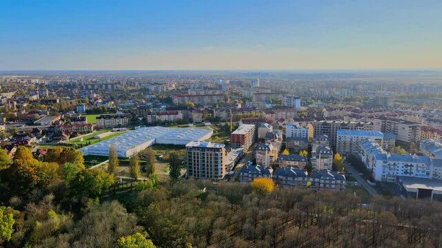 Drone is turning right Beautiful small village or township in the houses roofs around. Uzhhorod Ukraine Europe