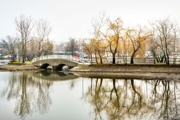 Outdoor scenery in  public park in Bucharest.Beautiful scenery on a cold day after a snowy day.Landscape photography