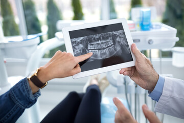 The patient and dentist are consulted about treatment of teeth