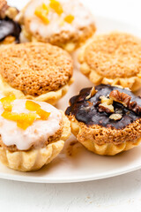 Sweet mini tart served on white plate
