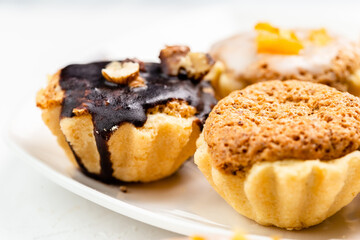 Sweet mini tart served on white plate