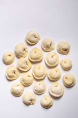 Dumplings making process, dough and minced meat