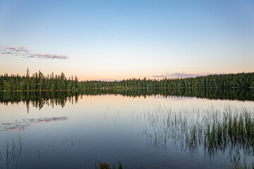 Obraz na płótnie Canvas sunset reflection on lake in norway