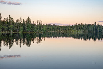 sunset reflection on lake in norway