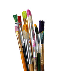 Fototapeta premium Different brushes with paints on white background