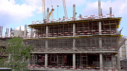 The building is under construction. Unfinished building in the city center