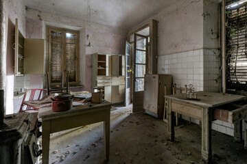 
Italy, January 20, 2021. Old kitchen in an abandoned villa in the Italian countryside.