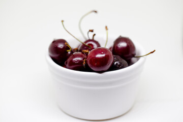 Fresh, ripe cherries isolated in white