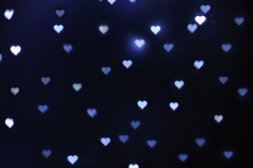 Beautiful heart shaped lights on dark background
