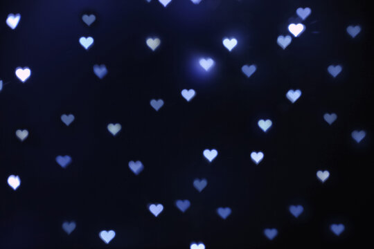 Beautiful heart shaped lights on dark background