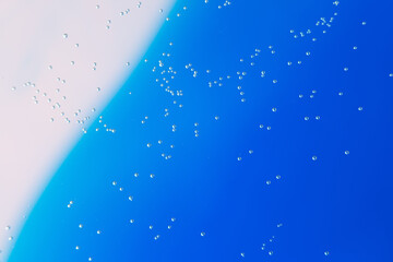 Abstract blue background with small bubbles