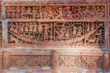Detail of boat with noble man smoking hookah intricate terracotta carving at Kantaji aka Kantajew medieval hindu temple in Kantanagar, Dinajpur, Bangladesh
