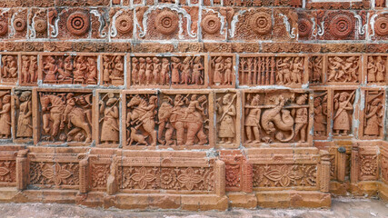 Beautiful terracotta carving scenes of Ramayana (top) and hunting party (bottom) at Kantaji aka Kantajew medieval hindu temple, Kantanagar, Dinajpur, Bangladesh