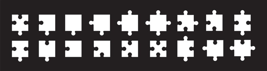 Set of white puzzle pieces isolated on black background - obrazy, fototapety, plakaty