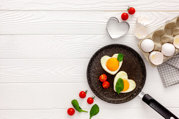 Naklejka na ściany i meble Breakfast on Valentine's Day Heart shape fried egg