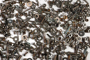 horizontal top view on bolts, nuts, screws. background .
white background