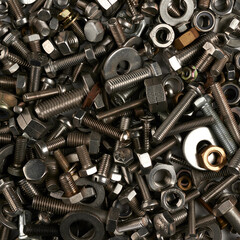 background with bolts, nuts, screws, top view, industrial background.close up view