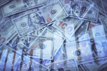Double exposure of forex graph drawing over us dollars bill background. Concept of financial markets.