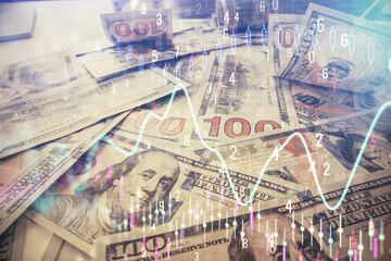 Multi exposure of forex chart drawing over us dollars bill background. Concept of financial success markets.