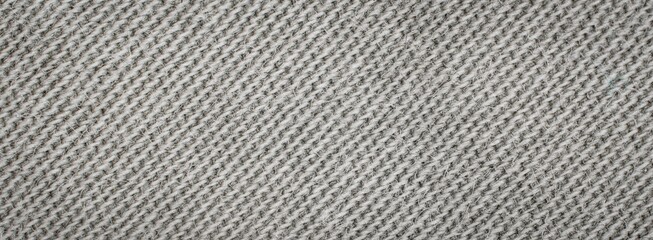 Fototapeta na wymiar macro photo of gray cotton material. background or textura