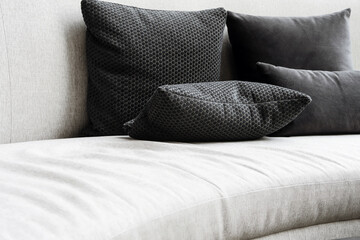 Detail image of cushion on sofa, modern living room.