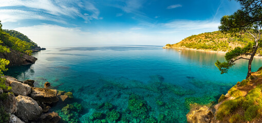 Coastline at Mediterranean sea near Fethiye Kabak Turkey. Warm sea, resort, relaxation, healthy lifestyle, hiking tour.