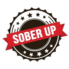 SOBER UP text on red brown ribbon stamp.