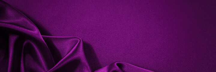 Black red purple silk satin background. Copy space for text or product. Wavy soft folds on shiny fabric. Luxurious magenta background. Valentine, Christmas, Anniversary, Black Friday. Web banner.