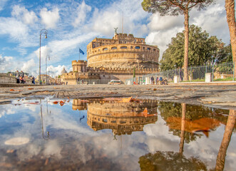 Rome, Italy - in Winter time, frequent rain showers create pools in which the wonderful Old Town of...