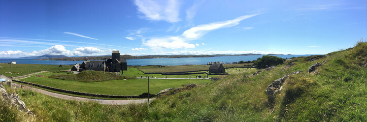 Isle of Iona (off Isle of Mull) in Scotland. Iona abbey in panoramic view