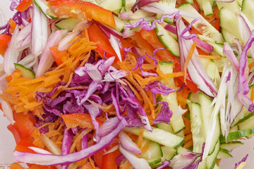 A fragment of the surface of a vegetable salad in close-up