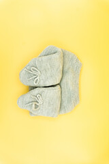 top view of winter baby pants on orange background. baby fashion concept. flat lay flat design
